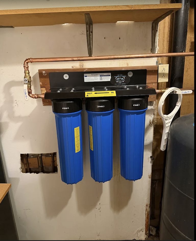 A whole-home water filtration system installed with clean copper lines by Top Tier Plumbing and Heating